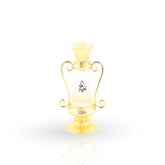 Golden Naema bottle with ornate handle design